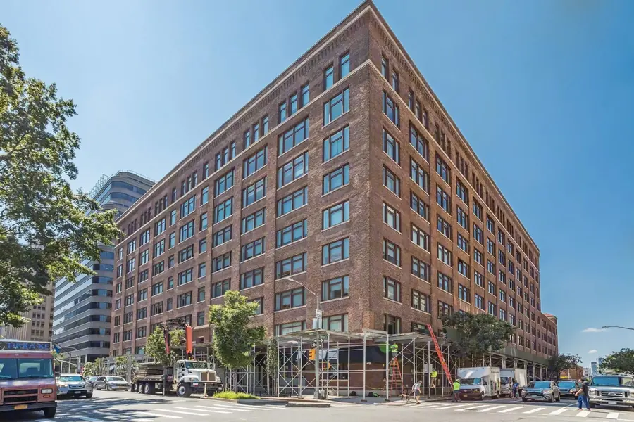 395 Hudson Street, a nine-story red-brick corner building