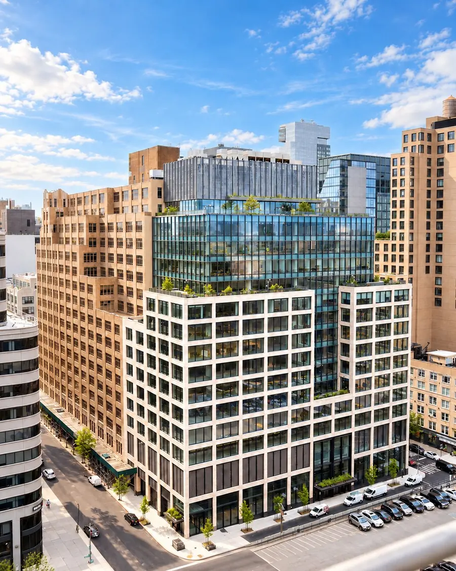 555 Greenwich Street, a stone and glass office building with rooftop terraces, seen from above