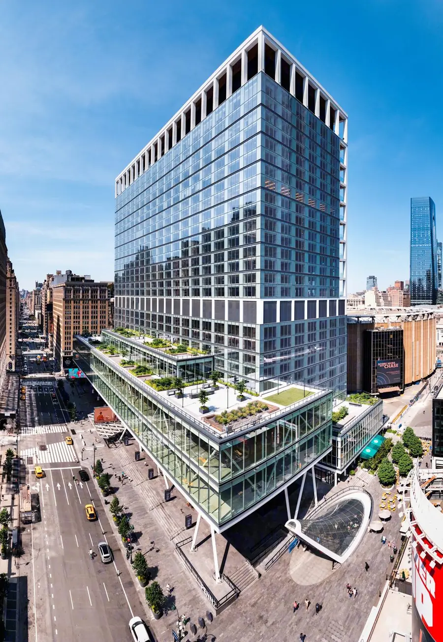 2 Pennsylvania Plaza, a glass office tower with terraced green roofs rising above Madison Square Garden and Seventh Avenue